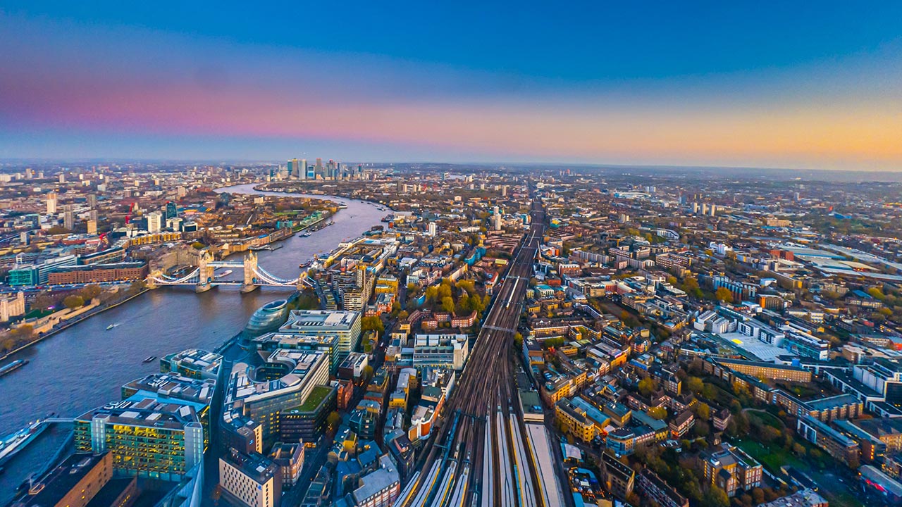 Aerial view of London showing the river thames and london bridge and the city